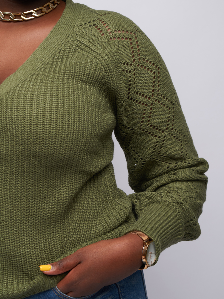This waist-length cardigan is a wardrobe essential with tight wrist stitching, top-to-bottom buttons, and stylish sleeve holes.