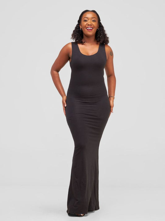 chic sleeveless maxi dress, featuring an elegant rounded neckline, double-layered construction, and a bold color-block panel at the bottom.
