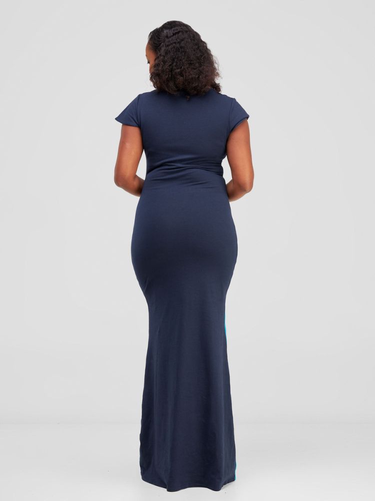 chic sleeveless maxi dress, featuring an elegant rounded neckline, double-layered construction, and a bold color-block panel at the bottom.