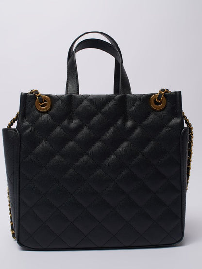 sophisticated leather tote bag with luxurious gold detailing on the handles