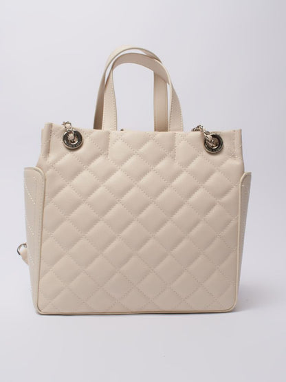 sophisticated leather tote bag with luxurious gold detailing on the handles