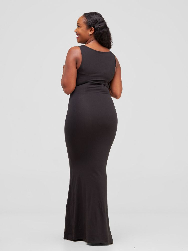 chic sleeveless maxi dress, featuring an elegant rounded neckline, double-layered construction, and a bold color-block panel at the bottom.