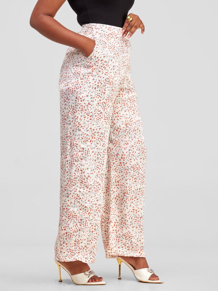 flowing palazzo pants with a discreet side zipper and a comfortably stretchy waistband at the rear. 