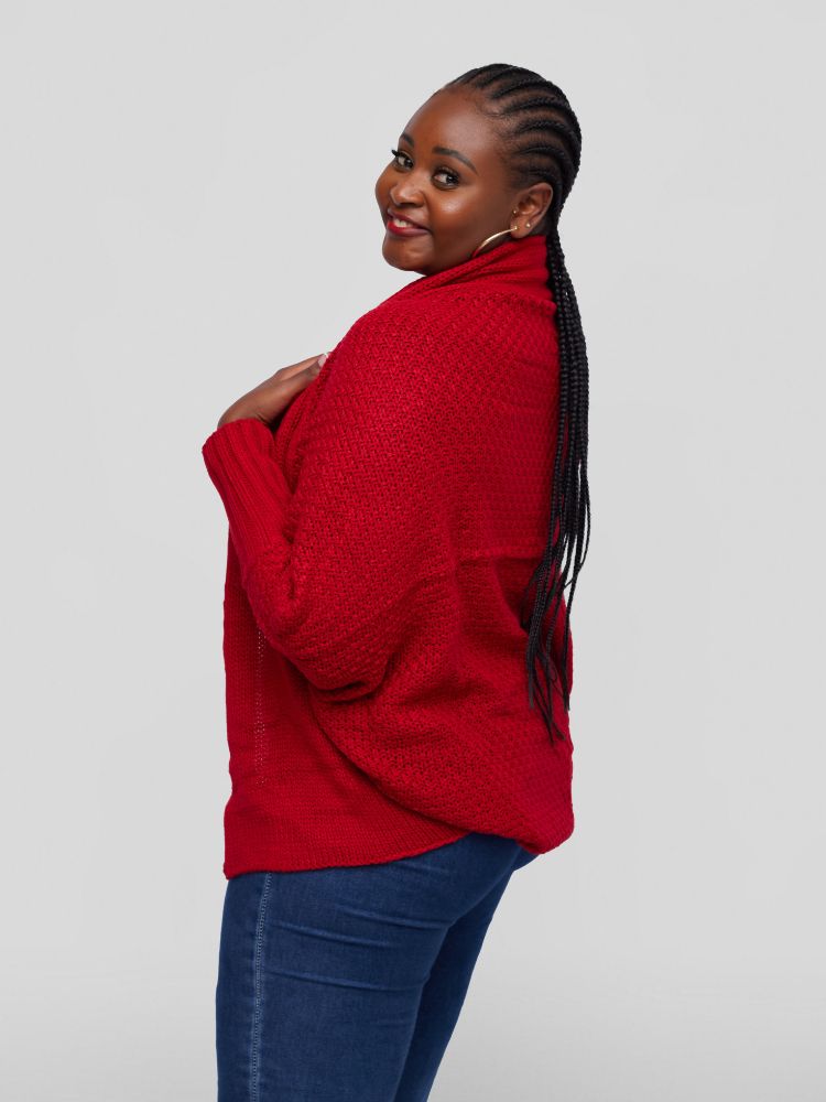 A hip length cardigan with a batwing long sleeve design.
