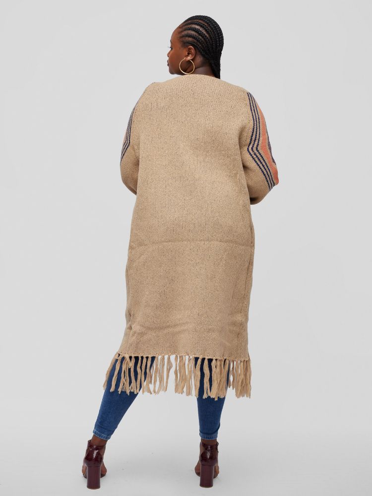 Open cardigan with long sleeves, a midi length, and playful tassel accents at the hem.