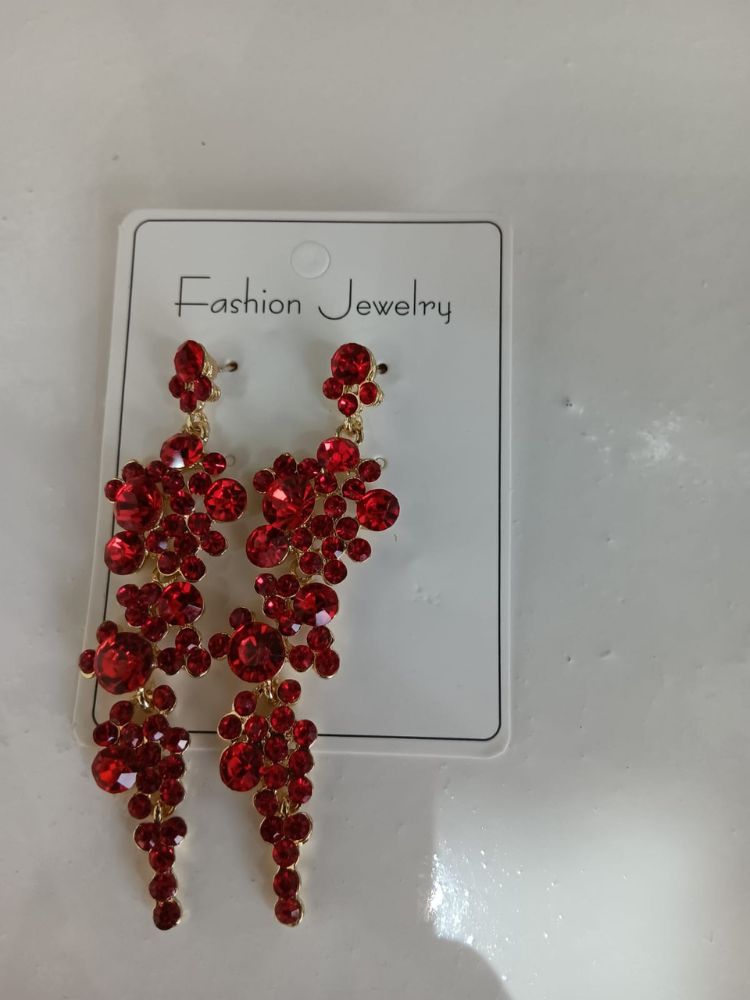 hanging earrings made of clusters of stones.